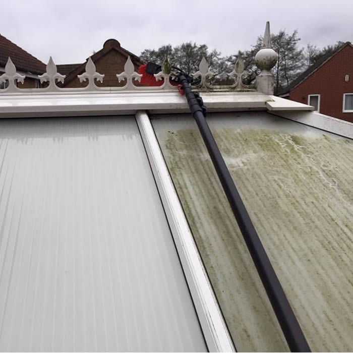 Conservatory roof half cleaned using pure water high reach pole system