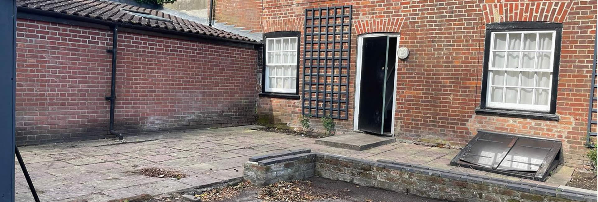 Courtyard before pressure washed