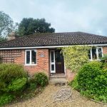 bungalow_lichen_algea_covered_roof_700x