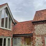 corner_farmhouse_before_roof_cleaned