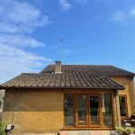 front_bungalow_moss_algae_dirty_roof_before_roof_clean_700x