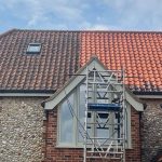 main_farmhouse_half_cleaned_roof