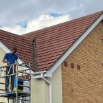 modern_house_before_roof_cleaning_scaffolding