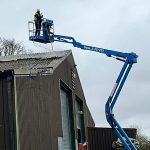 Cherry picker used for large roof cleans